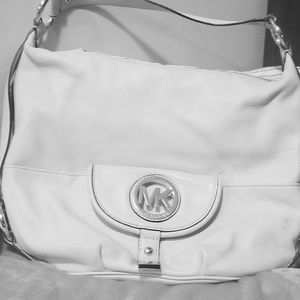 Michael Kors, and Dooney & Bourke Satchels